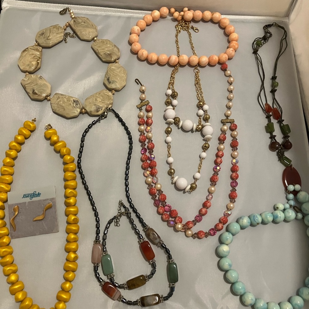 8 necklaces and 2 with matching bracelets
